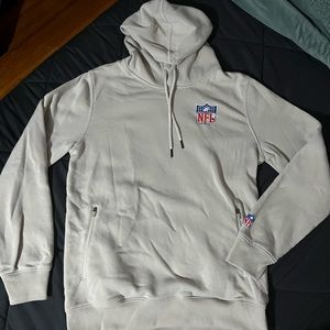 official NFL apparel, unisex size small hoodie with zipper pockets